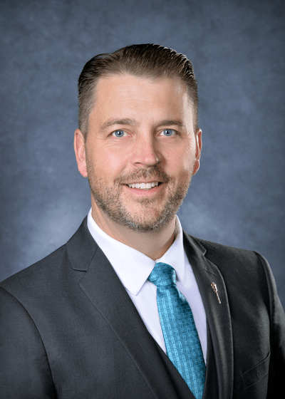 Hon. Tim McLeod, K.C.