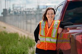 Female construction worker with vest