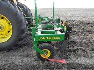 Deep ripper in field