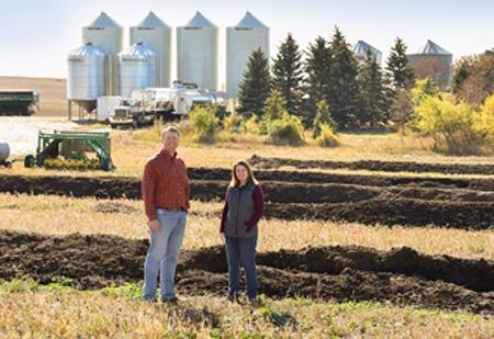 People standing in field