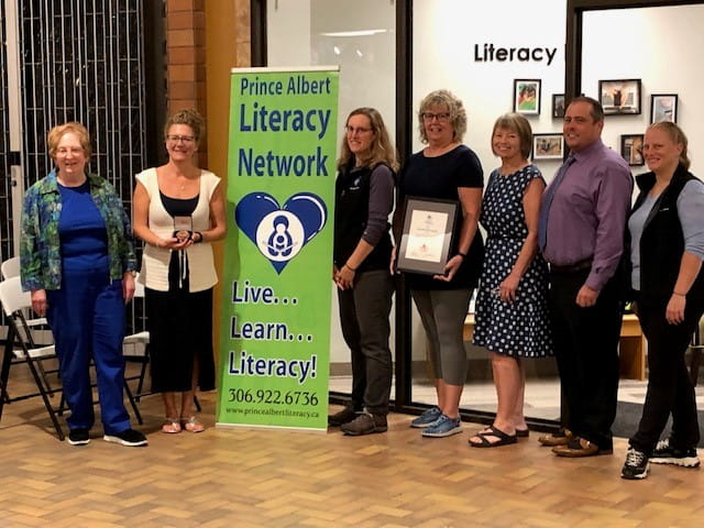 Prince Albert Literacy Network's employees and Board Chair receive the award 