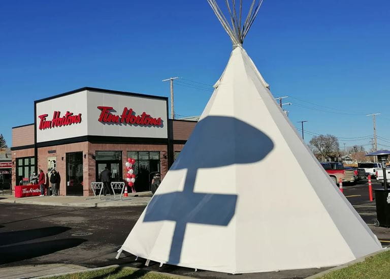 A teepee was raised at the grand opening of a Tim Hortons restaurant. The building and the land it sits on are owned by Cowessess First Nation.