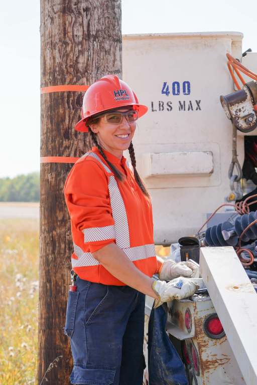 Powerline Technician apprentice working outside