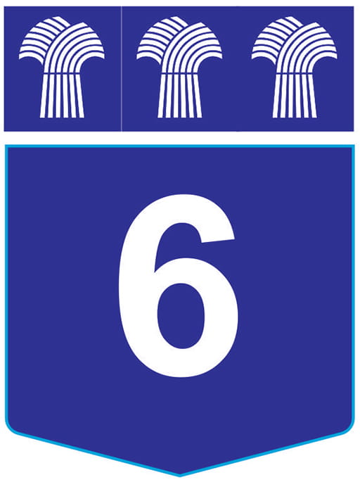 A Highway 6 route marker which has the number in white and the background in blue.