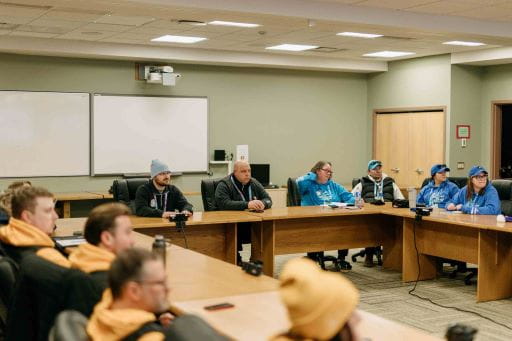 2026 Saskatchewan Winter Games Host Organizing Committee co-chairs Davin Hildebrandt, Dwight King and Regan Beck sitting at the front table addressing committee members.  History was made as the Games marked the first time two communities, the City of Meadow Lake and Flying Dust First Nation, had come together to host the event. Nearly 600 individuals from the two communities donated their time planning the event and taking care of the day-to-day activities during the Games.  Across Canada, National Volunteer Week is being celebrated from April 19 to 25. Help us thank these ordinary superstars who live next door to us ? people of all cultures, ages, and abilities.