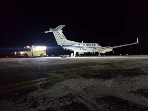 SAA plane and ambulance on runway