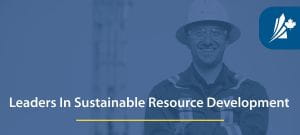 eaders in Sustainable Resource Development – Smiling worker in a hard hat.